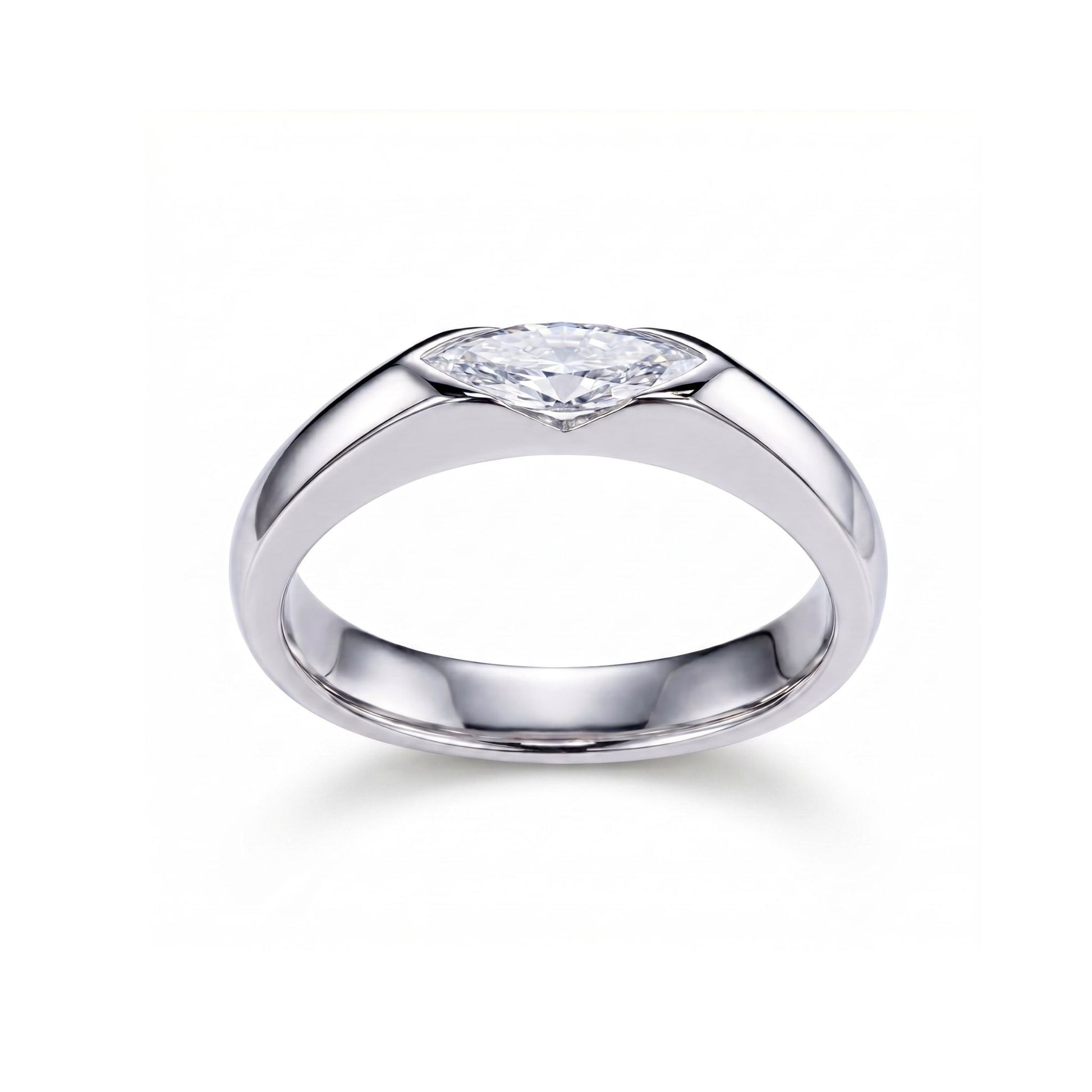 Top-down angled view showing marquise diamond tips and prong details on east-west platinum-plated solitaire ring, white background