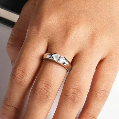 Marquise east-west solitaire platinum-plated ring worn on the finger of a man